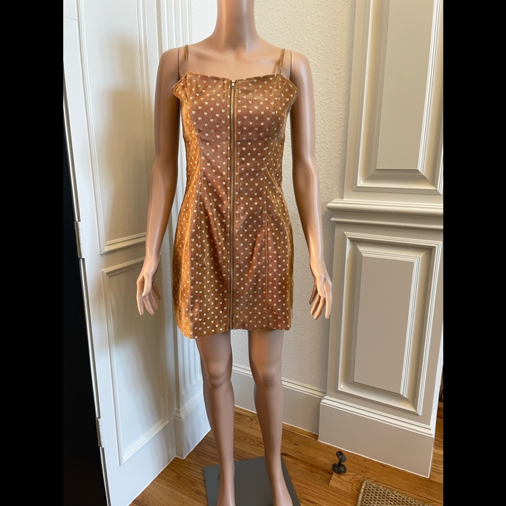 Le Lis dress in tan light weight corduroy with white hearts. Size S